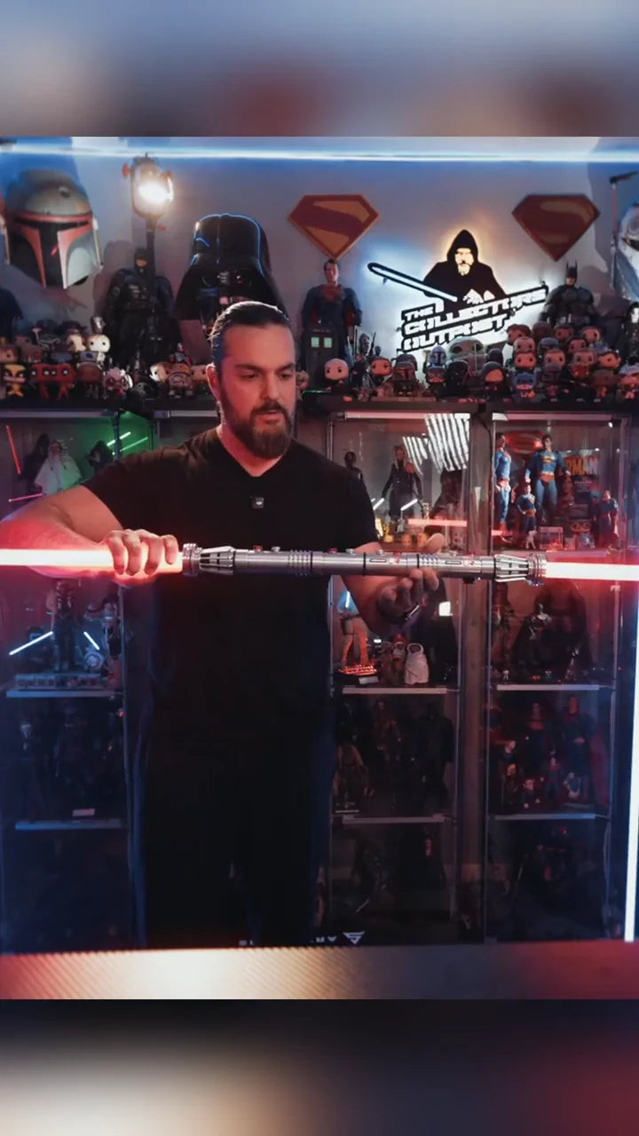 The Collectors Outpost holding the Maul saber with both red blades illuminated